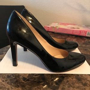 Black patent leather pumps